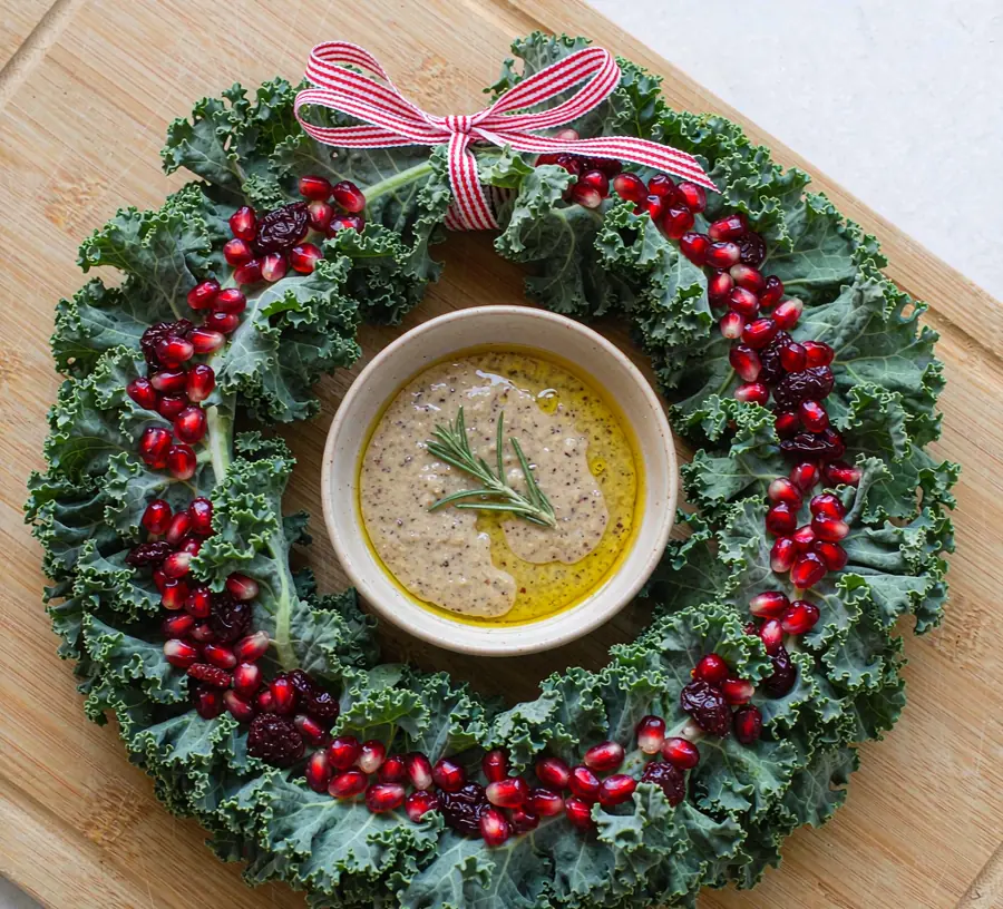 Kale and pomegranate Christmas wreath salad