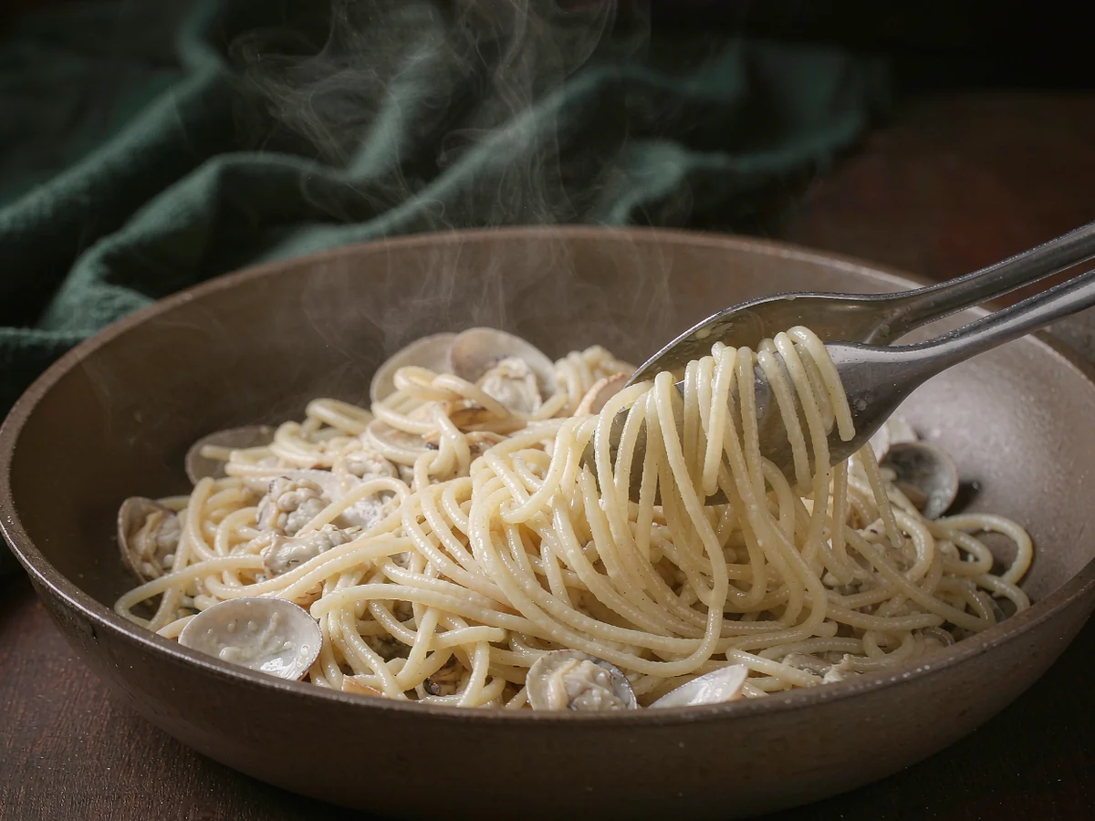 A Light Feast of the Seven Fishes Pasta - Toss pasta with the liquor
