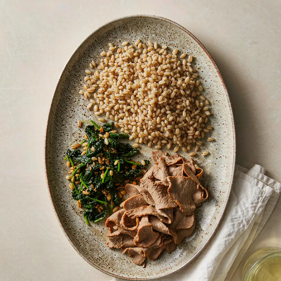 Five-Spice Turkey Farro Bowl with sliced turkey, farro and steamed greens
