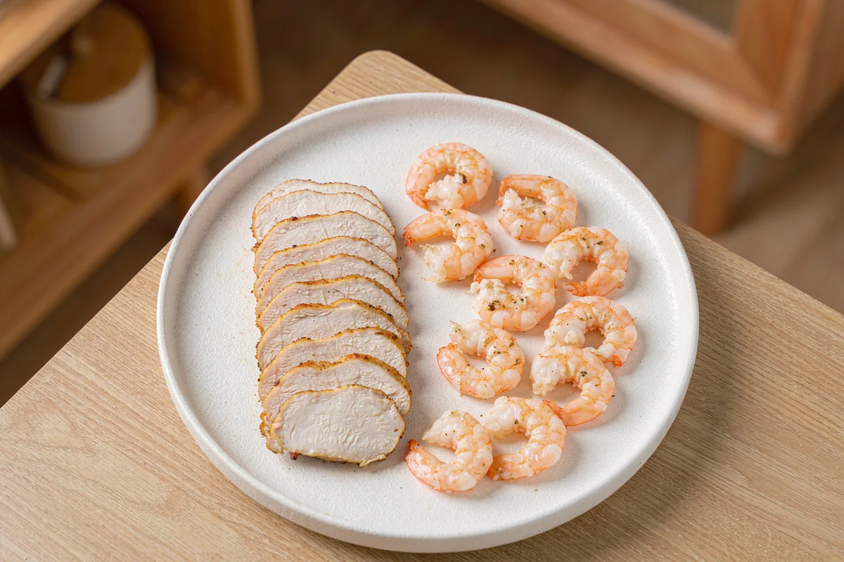 STEP 02 Prepare Proteins - seared chicken slices and poached shrimp